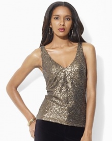 All-over glistening sequins lend an eye-catching allure to the Verra tank, crafted with a dramatic v neckline at the front and back for an effortlessly festive finish. All-over glistening sequins lend an eye-catching allure to the Verra tank, crafted with a dramatic v neckline at the front and back for an effortlessly festive finish.