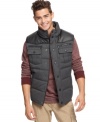 Stay warm in style this season with this Bar III Vest fleece puffer vest.