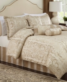 A gorgeous arrangement for a statement-making look, this jacquard woven Symphony comforter set showcases a luminous color scheme and elegant flourish design. Striped accents and decorative twisted cord finish the look. A gorgeous arrangement for a statement-making look, this jacquard woven Symphony comforter set showcases a luminous color scheme and elegant flourish design. Striped accents and decorative twisted cord finish the look.