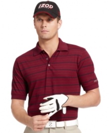 Stay cool on the links with this striped golf polo shirt featuring moisture wicking and UV finish from Izod.