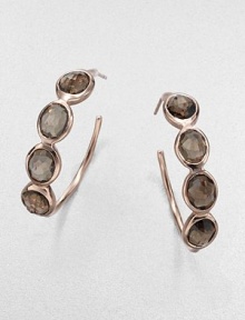 Four sparkling ovals of faceted smokey quartz in a setting of 18k gold and sterling silver with a glowing finish of 18k rose goldplating.Smokey quartz18k gold and sterling silver with 18k rose goldplatingLength, about 1.5Post backImported Four sparkling ovals of faceted smokey quartz in a setting of 18k gold and sterling silver with a glowing finish of 18k rose goldplating.Smokey quartz18k gold and sterling silver with 18k rose goldplatingLength, about 1.5Post backImported
