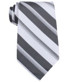 Follow the lines in your look with this sleek striped tie from Calvin Klein.