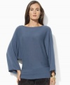 Look relaxed and polished in Lauren Ralph Lauren's three-quarter-sleeved petite boatneck top, fashioned in a substantial cotton jersey with dolman sleeves for comfort and a sleek silhouette.