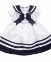 Set sail. She'll be ready for any adventure in this sailor-styled dress from Bonnie Baby.
