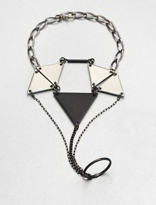 From the Facet Collection. This distinctive design of powder-coated brass and pewter triangles clasps around the wrist, slips around one finger and drapes across the hand for eye-catching drama.Powder-coated brass and pewterLength around wrist, about 8 (adjustable)Lobster claspMade in USA From the Facet Collection. This distinctive design of powder-coated brass and pewter triangles clasps around the wrist, slips around one finger and drapes across the hand for eye-catching drama.Powder-coated brass and pewterLength around wrist, about 8 (adjustable)Lobster claspMade in USA