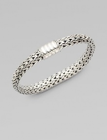 A mid-sized, intricately woven sterling silver chain design. Sterling silver Push clasp closure Length, about 6½ Imported 