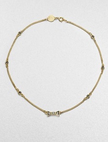 A delicate chain is dotted with faceted glass stones in a glistening silver golor with a graceful bow in front.Glass10k goldplated finishLength, about 19Spring ring claspImported A delicate chain is dotted with faceted glass stones in a glistening silver golor with a graceful bow in front.Glass10k goldplated finishLength, about 19Spring ring claspImported