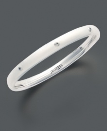 A touch of sweet sparkle for tiny wrists. This children's bangle is crafted in sterling silver with glittering diamond accents. Approximate diameter: 2 inches. A touch of sweet sparkle for tiny wrists. This children's bangle is crafted in sterling silver with glittering diamond accents. Approximate diameter: 2 inches.