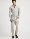 Crisp woven cotton, tailored in a classic style and patterned with sharp vertical stripes.Button-down shirt collarButton placketPatch pocketLong sleeves with button cuffsBack yoke with inverted back pleatCottonMachine washMade in Italy
