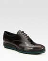 Cool, contrast sole enhances this sleek, leather lace-up style.Leather upperLeather liningRubber soleMade in Italy