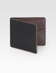An inspired look based on a classic suiting pinstripe with a pebbled leather interior. Backed for stability and durability Bill compartment Six card slots About 4 X 3½ Imported An inspired look based on a classic suiting pinstripe with a pebbled leather interior. Backed for stability and durability Bill compartment Six card slots About 4 X 3½ Imported