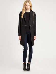 Herringbone tweed in a wool blend with front leather paneling and a long silhouette that can be unzipped and worn as a cropped jacket. Notched collarFront leather panelsButton frontHorizontal zipperLong bishop sleevesFully linedAbout 38 from shoulder to hem65% wool/35% polyesterDry cleanImportedModel shown is 5'11 (178cm) wearing US size 2. Herringbone tweed in a wool blend with front leather paneling and a long silhouette that can be unzipped and worn as a cropped jacket. Notched collarFront leather panelsButton frontHorizontal zipperLong bishop sleevesFully linedAbout 38 from shoulder to hem65% wool/35% polyesterDry cleanImportedModel shown is 5'11 (178cm) wearing US size 2.