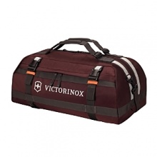 This Victorinox duffle bag offers two ways to travel: a removable, adjustable padded shoulder strap, or adjustable backpack straps for heavier loads. Center zip pocket leads to a spacious main packing area that features a mesh zippered pocket. Exterior zip pocket. Lockable YKK racquet coil zippers. This Victorinox duffle bag offers two ways to travel: a removable, adjustable padded shoulder strap, or adjustable backpack straps for heavier loads. Center zip pocket leads to a spacious main packing area that features a mesh zippered pocket. Exterior zip pocket. Lockable YKK racquet coil zippers.