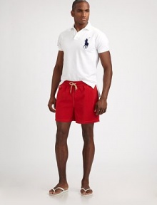 Rendered from breathable cotton mesh, a trim-fitting polo shirt gets a bold update with neon accents for a sporty finish.Two-button placketCottonMachine washImported Rendered from breathable cotton mesh, a trim-fitting polo shirt gets a bold update with neon accents for a sporty finish.Two-button placketCottonMachine washImported