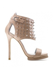 Super spiky studs offer tough-girl appeal to these edgy harness sandals from Camilla Skovgaard.