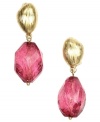 Appealing in pink. Jones New York's boldly beaded drop earrings combine pink plastic beads with a gold-plated mixed metal setting. Earrings have a clip-on backing for non-pierced ears. Approximate drop: 1-1/4 inches.