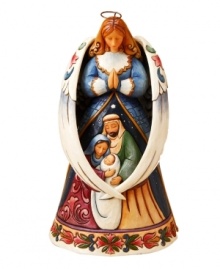 Jim Shore's Angel and Holy Family figurine inspires a moment of quiet reflection on the true spirit of Christmas.