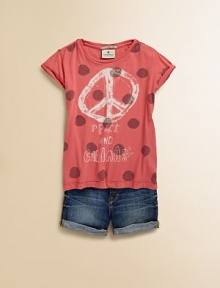 A cute graphic tee with big polka dots and a peace sign give it a fun, girlie feel.ScoopneckShort sleeves with rolled cuffsPatch on left sleeveGraphic print on front and backStitched hemCottonMachine washImported