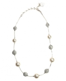 Add a chic appearance to your wardrobe with AK Anne Klein's shimmering strand necklace. Embellished with imitation glass pearls and sparkling crystal pave balls, it's crafted in imitation rhodium plated mixed metal. Approximate length: 16 inches + 3-inch extender. Add a chic appearance to your wardrobe with AK Anne Klein's shimmering strand necklace. Embellished with imitation glass pearls and sparkling crystal pave balls, it's crafted in imitation rhodium plated mixed metal. Approximate length: 16 inches + 3-inch extender.