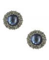 Diminutive yet dazzling. Spotlighting sapphire colored crystals surrounded by glittering clear crystal accents, Kenneth Cole New York's round stud earrings are simply stunning. Crafted in hematite tone mixed metal. Approximate diameter: 1/2 inch.