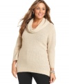 Let your look shimmer this season with Style&co.'s long sleeve plus size sweater, featuring a metallic finish.