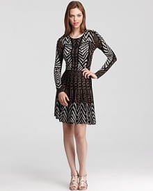 An abstract, geometric print lends a modern feel to this BCBGMAXAZRIA sweater dress--a flared skirt gives a girlish look.