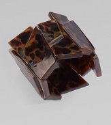 Glossy, geometric tortoise panels make for a serious statement piece.HornCircumference, about 7¼Width, about 2½Slip-on styleImported