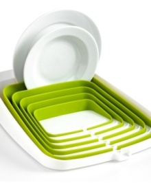 The home team hangs those dishes out to dry! The competition is over, the Arena draining rack seats your plates, bowls, cups and more in a compact design that whisks water away and straight into the sink. Flexible ribs keep contents secure and prevent chips, scratches and major upsets. The home team hangs those dishes out to dry! The competition is over, the Arena draining rack seats your plates, bowls, cups and more in a compact design that whisks water away and straight into the sink. Flexible ribs keep contents secure and prevent chips, scratches and major upsets.