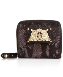 Take a walk on the wilder side with this python print wallet from Juicy Couture. Crafted in plush velour with rich leather trim and signature golden hardware, it's the perfect way to stay exotically organized. Take a walk on the wilder side with this python print wallet from Juicy Couture. Crafted in plush velour with rich leather trim and signature golden hardware, it's the perfect way to stay exotically organized.