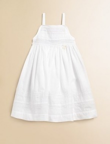 This angelic A-line silhouette is topped with pintucked and embroidered details.SquareneckSpaghetti strapsBack buttonsFull skirtCottonMachine washImported Please note: Number of buttons may vary depending on size ordered. This angelic A-line silhouette is topped with pintucked and embroidered details.SquareneckSpaghetti strapsBack buttonsFull skirtCottonMachine washImported Please note: Number of buttons may vary depending on size ordered.