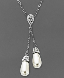 Twice the elegance. Two polished crystal teardrops adorn Kaleidoscope's stunning lariat pendant necklace. Crafted in sterling silver with Swarovski Elements. Approximate length: 18 inches. Approximate drop: 1-9/10 inches. Twice the elegance. Two polished crystal teardrops adorn Kaleidoscope's stunning lariat pendant necklace. Crafted in sterling silver with Swarovski Elements. Approximate length: 18 inches. Approximate drop: 1-9/10 inches.