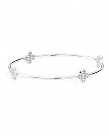 The clover-shaped stations on this delicate bangle from Crislu strike a distinctive balance between classic iconography and contemporary sparkle. The clover-shaped stations on this delicate bangle from Crislu strike a distinctive balance between classic iconography and contemporary sparkle.