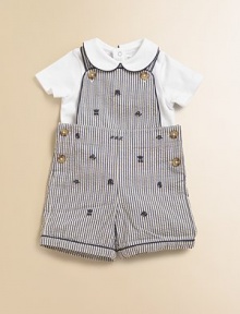 Preppy heritage style is adorably interpreted with an ultra-comfortable cotton jersey set that pairs a striped seersucker overall with a short-sleeved solid bodysuit. Overall Button-front shoulder strapsSleevelessSide buttons Bodysuit Peter Pan collarShort sleevesBack snapsBottom snapsCottonMachine washImported Please note: Number of buttons/snaps may vary depending on size ordered. Additional InformationKid's Apparel Size Guide Preppy heritage style is adorably interpreted with an ultra-comfortable cotton jersey set that pairs a striped seersucker overall with a short-sleeved solid bodysuit. Overall Button-front shoulder strapsSleevelessSide buttons Bodysuit Peter Pan collarShort sleevesBack snapsBottom snapsCottonMachine washImported Please note: Number of buttons/snaps may vary depending on size ordered. Additional InformationKid's Apparel Size Guide