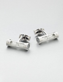 Brass cuff links with an hour glass accent lends an unexpected flair to a timeless wardrobe essential.Brass/sandAbout ¼ diam.Made in the United Kingdom Brass cuff links with an hour glass accent lends an unexpected flair to a timeless wardrobe essential.Brass/sandAbout ¼ diam.Made in the United Kingdom