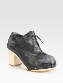 Raw edges and a wooden textured heel transform this vintage-inflected staple of distressed leather. Wooden leaf-embossed heel, 3½ (90mm)Wooden and leather-covered platform, 1¼ (30mm)Compares to a 2¼ heel (60mm)Distressed leather upperLeather liningRubber solePadded insoleImported Raw edges and a wooden textured heel transform this vintage-inflected staple of distressed leather. Wooden leaf-embossed heel, 3½ (90mm)Wooden and leather-covered platform, 1¼ (30mm)Compares to a 2¼ heel (60mm)Distressed leather upperLeather liningRubber solePadded insoleImported