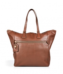 Detailed in classic brown leather with a streamlined look, Marc by Marc Jacobs timeless tote lends a polished edge to every outfit - Zippered front pocket with luggage tag, metallic embossed logo, double top handles, zippered top, inside zippered back wall pocket, front wall slot pockets - Perfect for work, school, or weekend shopping Detailed in classic brown leather with a streamlined look, Marc by Marc Jacobs timeless tote lends a polished edge to every outfit - Zippered front pocket with luggage tag, metallic embossed logo, double top handles, zippered top, inside zippered back wall pocket, front wall slot pockets - Perfect for work, school, or weekend shopping