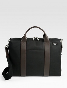 Protect your investments and stay organized with this sturdy briefcase crafted in waxed cotton.Zip closureTop handlesAdjustable shoulder strap16½W x 12H x 3¼DImported Protect your investments and stay organized with this sturdy briefcase crafted in waxed cotton.Zip closureTop handlesAdjustable shoulder strap16½W x 12H x 3¼DImported