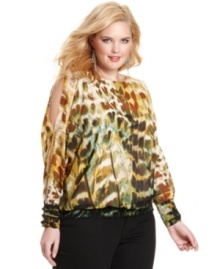 Electrify your look with Jessica Simpson's plus size printed blouse, featuring sleeve cutouts.