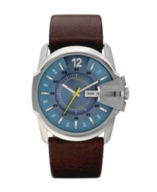 Seamlessly marrying modern and traditional aesthetics, this Diesel watch plays well with a wide range of personal styles. Brown leather strap and round stainless steel case, 45x27mm. Bezel engraved with logo at three o'clock. Blue sunray dial featuring a matte texture with printed and applied stick indices, numeral at twelve o'clock, day and date window at three o'clock and yellow accents. Quartz movement. Water resistant to 100 meters. Two-year limited warranty. Seamlessly marrying modern and traditional aesthetics, this Diesel watch plays well with a wide range of personal styles. Brown leather strap and round stainless steel case, 45x27mm. Bezel engraved with logo at three o'clock. Blue sunray dial featuring a matte texture with printed and applied stick indices, numeral at twelve o'clock, day and date window at three o'clock and yellow accents. Quartz movement. Water resistant to 100 meters. Two-year limited warranty.