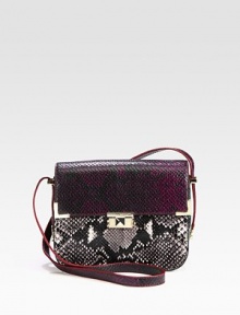 A chic python embossed leather style in a fun colorblock design with radiant hardware.Adjustable shoulder strap, 9½-13½ dropPush-lock flap closureThree inner compartmentsOne inside open pocketCotton lining8¾W X 7H X 2½DImported A chic python embossed leather style in a fun colorblock design with radiant hardware.Adjustable shoulder strap, 9½-13½ dropPush-lock flap closureThree inner compartmentsOne inside open pocketCotton lining8¾W X 7H X 2½DImported