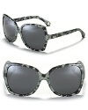 Go glam in D&G's oversized sunglasses and take a new look at the season of sun.