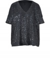 Easy and glamorous with its allover tonal sequins, DKNYs loosely draped dolman-sleeve tee counts as a must for your cocktails wardrobe - V-neckline, elbow-length dolman sleeves with stitched cuffs - Loosely draped fit - Wear with figure-hugging separates and statement heels