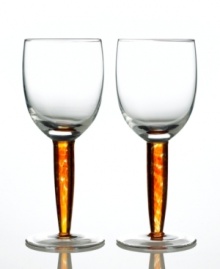 Fire up the casual table with Denby. Simply shaped wine glasses spark drama with brightly colored stems. Shades of red, orange and yellow mix and swirl in luminous glass. Pair with Fire dinnerware, also by Denby. Fire up the casual table with Denby. Simply shaped wine glasses spark drama with brightly colored stems. Shades of red, orange and yellow mix and swirl in luminous glass. Pair with Fire dinnerware, also by Denby.