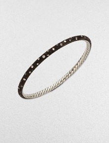 From the Midnight Melange Collection. This perfectly, elegant design boasts a beautiful, blackened sterling silver textured surface with a smattering of brilliant diamonds. Blackened sterling silverDiamonds, 1.04 tcwSterling silverWidth, about 1/8Diameter, about 2½Slip-on styleImported From the Midnight Melange Collection. This perfectly, elegant design boasts a beautiful, blackened sterling silver textured surface with a smattering of brilliant diamonds. Blackened sterling silverDiamonds, 1.04 tcwSterling silverWidth, about 1/8Diameter, about 2½Slip-on styleImported