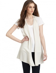 THE LOOKSleevelessRuching at shouldersOpen frontRolled hemSeamed detail at backTHE FITAbout 31 from shoulder to hemTHE MATERIALCashmereCARE & ORIGINDry cleanImportedModel shown is 5'8½ (174cm) wearing US size Small. THE LOOKSleevelessRuching at shouldersOpen frontRolled hemSeamed detail at backTHE FITAbout 31 from shoulder to hemTHE MATERIALCashmereCARE & ORIGINDry cleanImportedModel shown is 5'8½ (174cm) wearing US size Small.