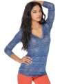 An allover croc print adds a fierce flair to this BCBGMAXAZRIA top -- a stylish twist on a wardrobe staple!