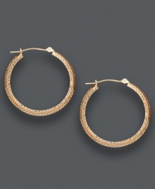 A stylish complement to any ensemble. These medium-sized hoops feature a 14k rose gold setting with a unique diamond-cut design. Approximate diameter: 1-1/8 inches. A stylish complement to any ensemble. These medium-sized hoops feature a 14k rose gold setting with a unique diamond-cut design. Approximate diameter: 1-1/8 inches.