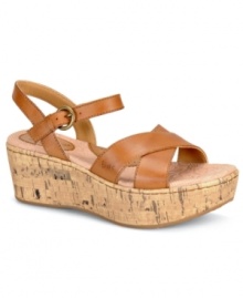 A great cork wedge sandal with a retro-vibe. They're just begging for a pair of colorful, high-wasted shorts. The uniform wedge adds height without sacrificing walkability.