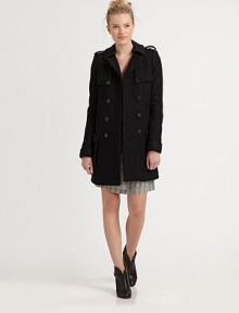 A classic double-breasted silhouette, styled with oversized flap pockets, all in rich blended wool.Notch collarEpaulettesChest pocketsGun flapsButton frontWelt pocketsFlat pocketsInverted back pleatAbout 32 from shoulder to hem70% wool/30% nylonDry cleanImportedModel shown is 5'10 (177cm) wearing US size Small. A classic double-breasted silhouette, styled with oversized flap pockets, all in rich blended wool.Notch collarEpaulettesChest pocketsGun flapsButton frontWelt pocketsFlat pocketsInverted back pleatAbout 32 from shoulder to hem70% wool/30% nylonDry cleanImportedModel shown is 5'10 (177cm) wearing US size Small.