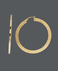 Nothing says classic and cool like the perfect pair of hoops. This trendy style features a unique hammered design on a flat surface. Crafted in 14k gold. Approximate diameter: 1-9/10 inches. Nothing says classic and cool like the perfect pair of hoops. This trendy style features a unique hammered design on a flat surface. Crafted in 14k gold. Approximate diameter: 1-9/10 inches.